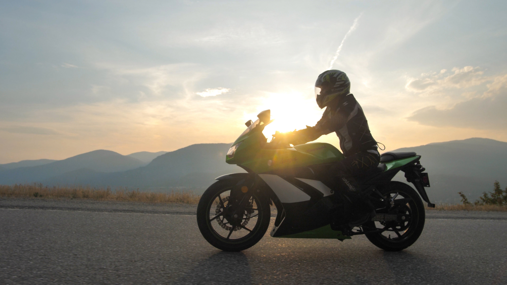 Best_Motorcycle_Rides_Around_Castlegar_2 rider drives the Best Motorcycle Rides Around Castlegar during sunset